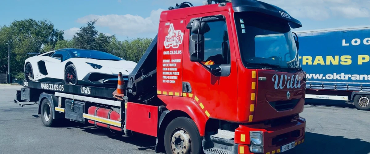 Camion rouge Willi Dépannage avec véhicule sur plateau